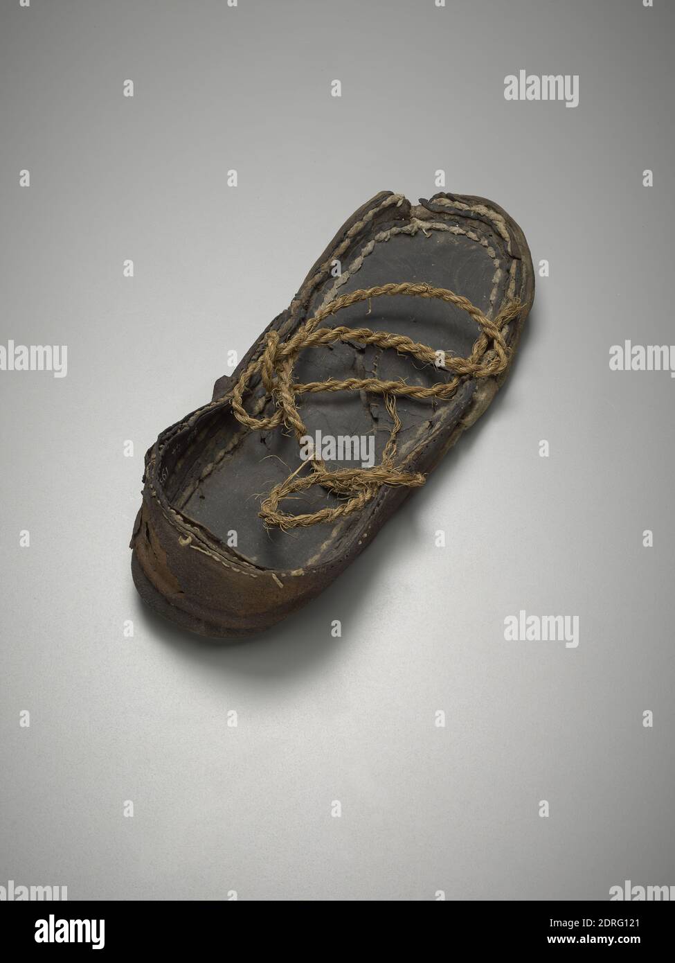 Leather Sandal, ca. 323 B.C.–A.D. 256, Leather and natural cord rope, 10.2  × 26.2 cm (4 × 10 5/16 in.), Yale-French Excavations at Dura-Europos,  Excavated in Dura-Europos, Syria, Syrian, Dura-Europos, Greco-Roman or  Parthian,