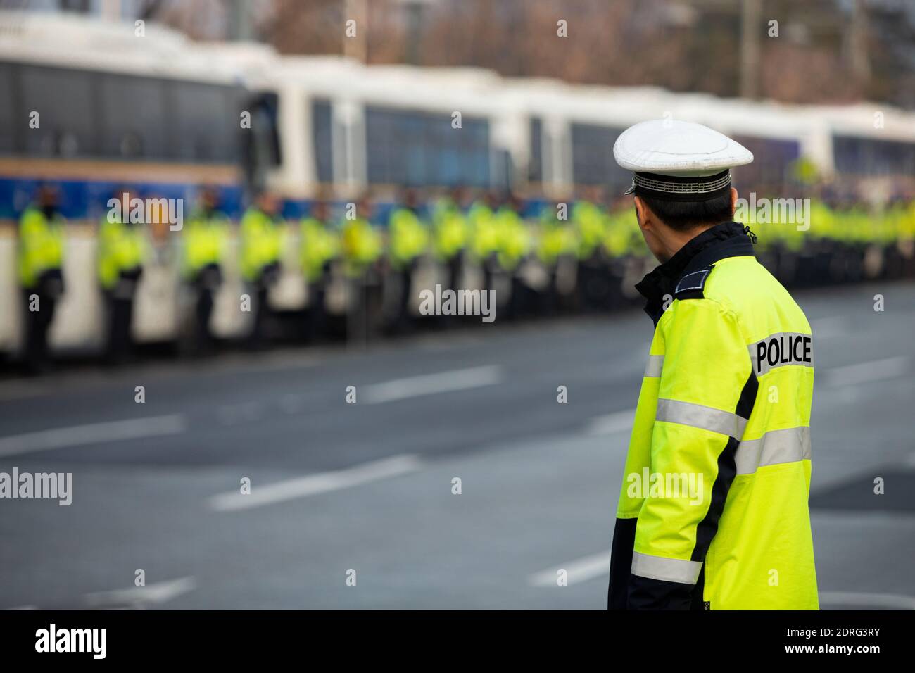 Police officers during an anti-government demonstration Stock Photo