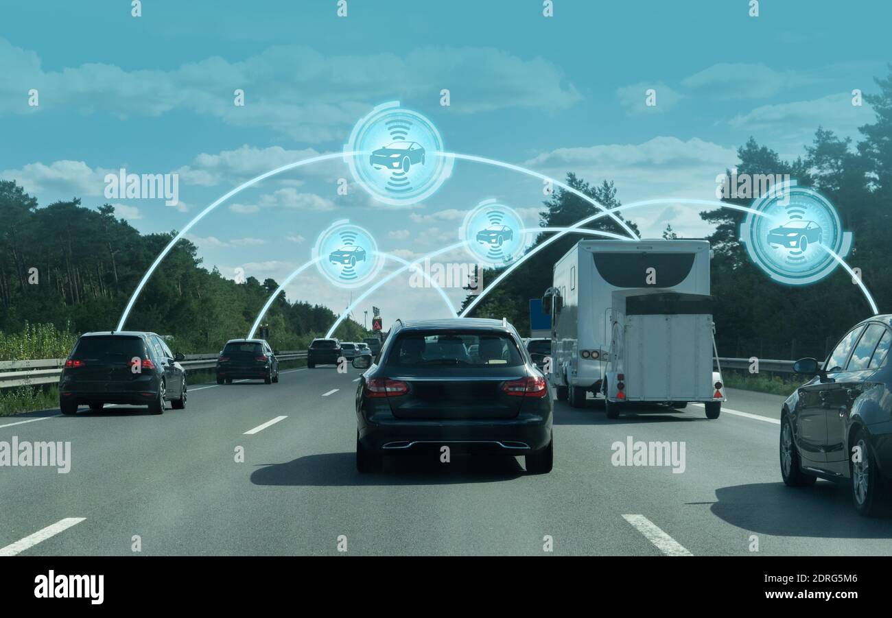 Vehicle to vehicle communication. Data exchange between cars. Stock Photo