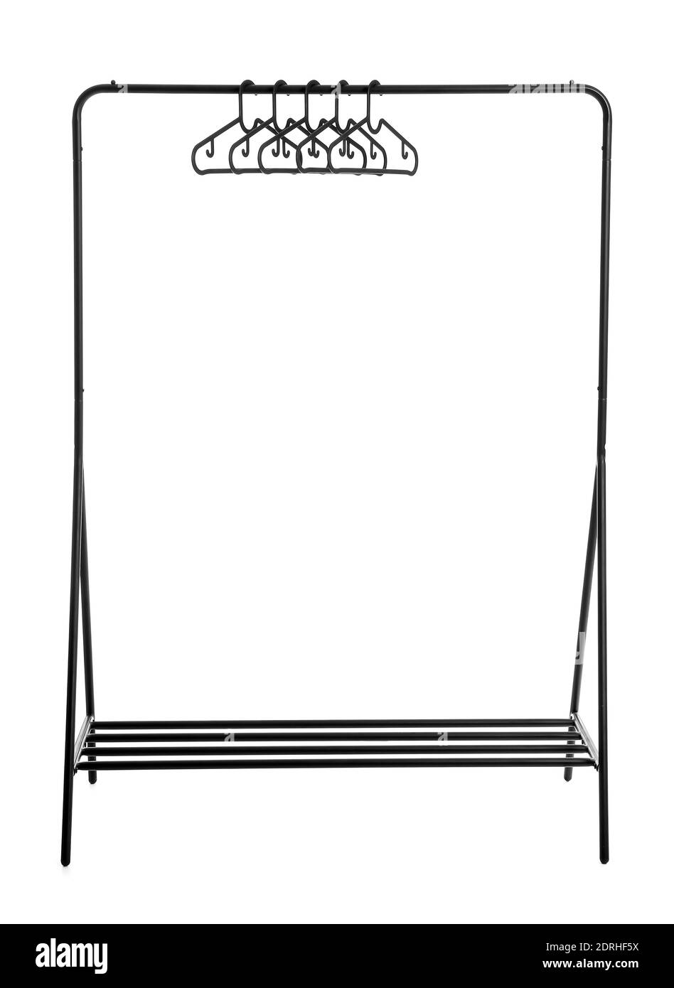 Rack with clothes hangers on white background Stock Photo - Alamy