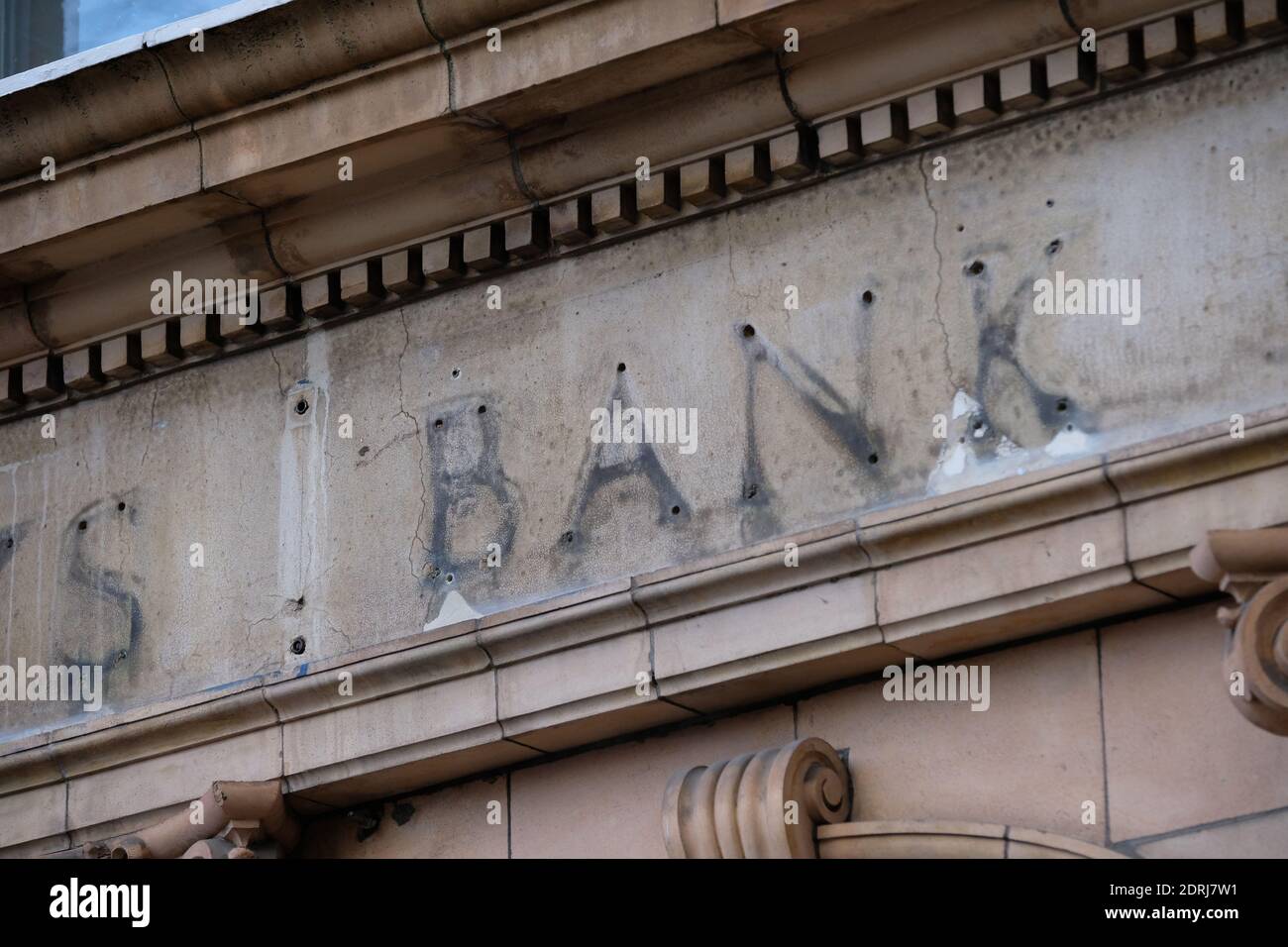 The remains of a sign over a former branch of Barclays Bank, now closed, in Kew Gardens, south west London. Stock Photo