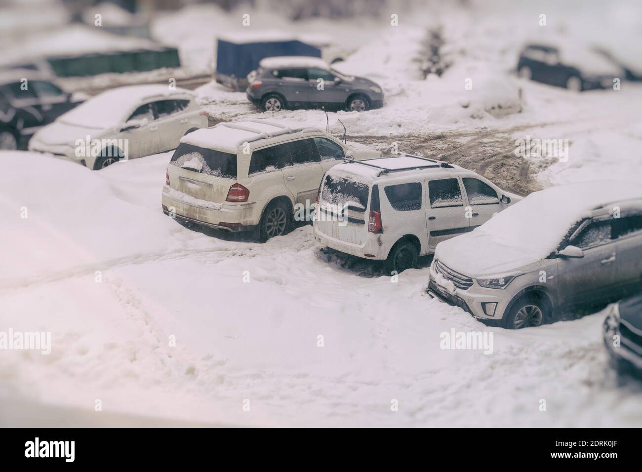 Cars covered with snow in the Parking lot Stock Photo - Alamy