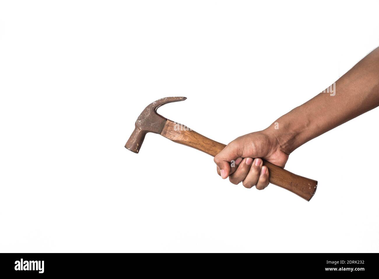 hand and Hammer strike nail on isolated background Stock Photo - Alamy