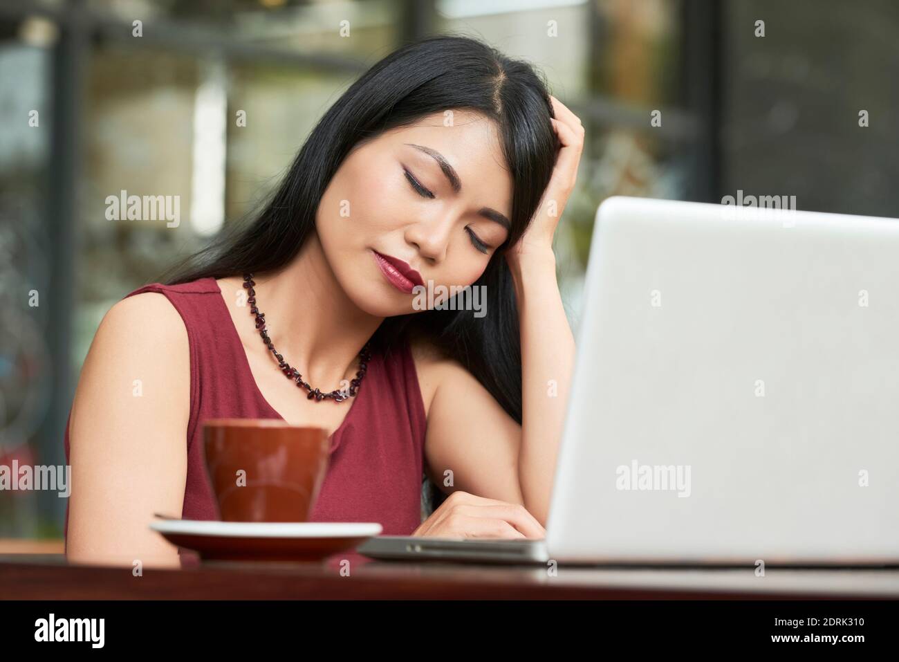 Exhausted businesswoman Stock Photo