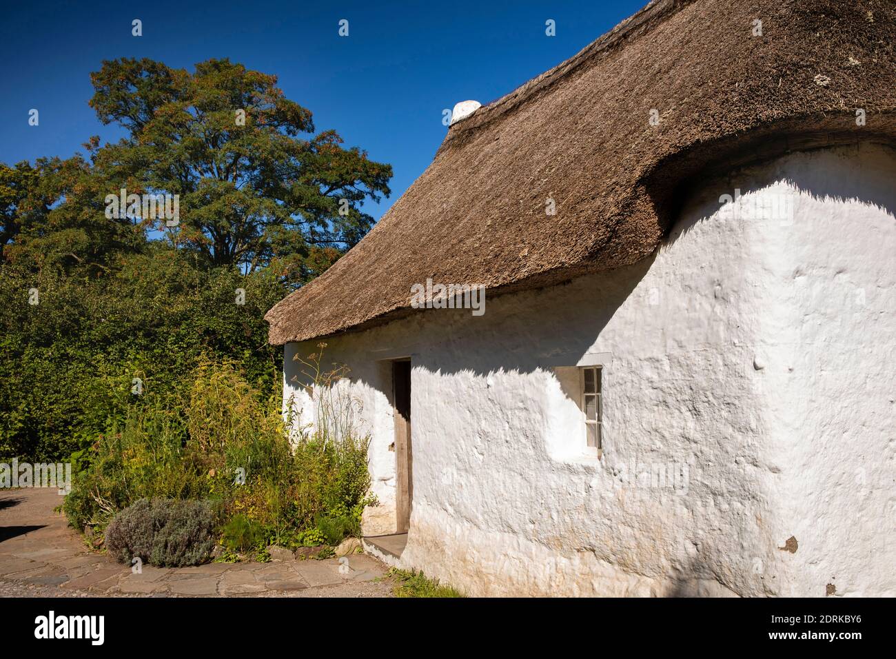 UK, Wales, Cardiff, St Fagans, National Museum of History, Nantwallter Cottage, c1770 mud (clom) built farm labourer’s home from Tallaris Carmarthensh Stock Photo