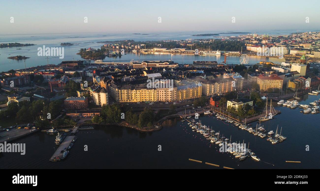 Forstyrre Blive skør Pearly Aerial view of sunlit Helsinki Katajanokka cityscape, colorful, sunny,  morning sunrise, in Helsingfors city, Finland - drone shot Stock Photo -  Alamy
