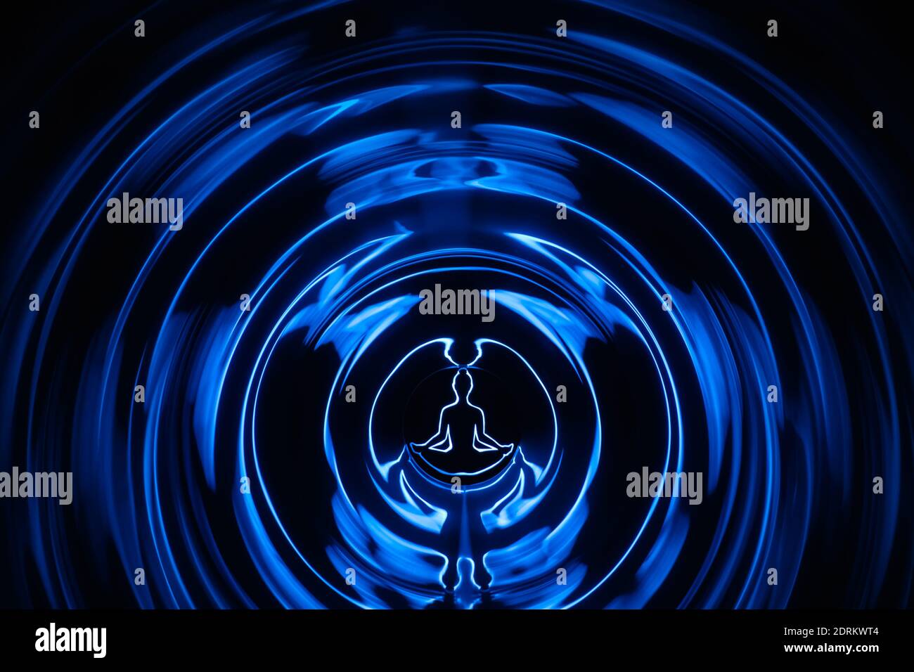 Yoga meditation hands woman in yoga lotus pose with aura spiritual. Balancing your life concept Stock Photo