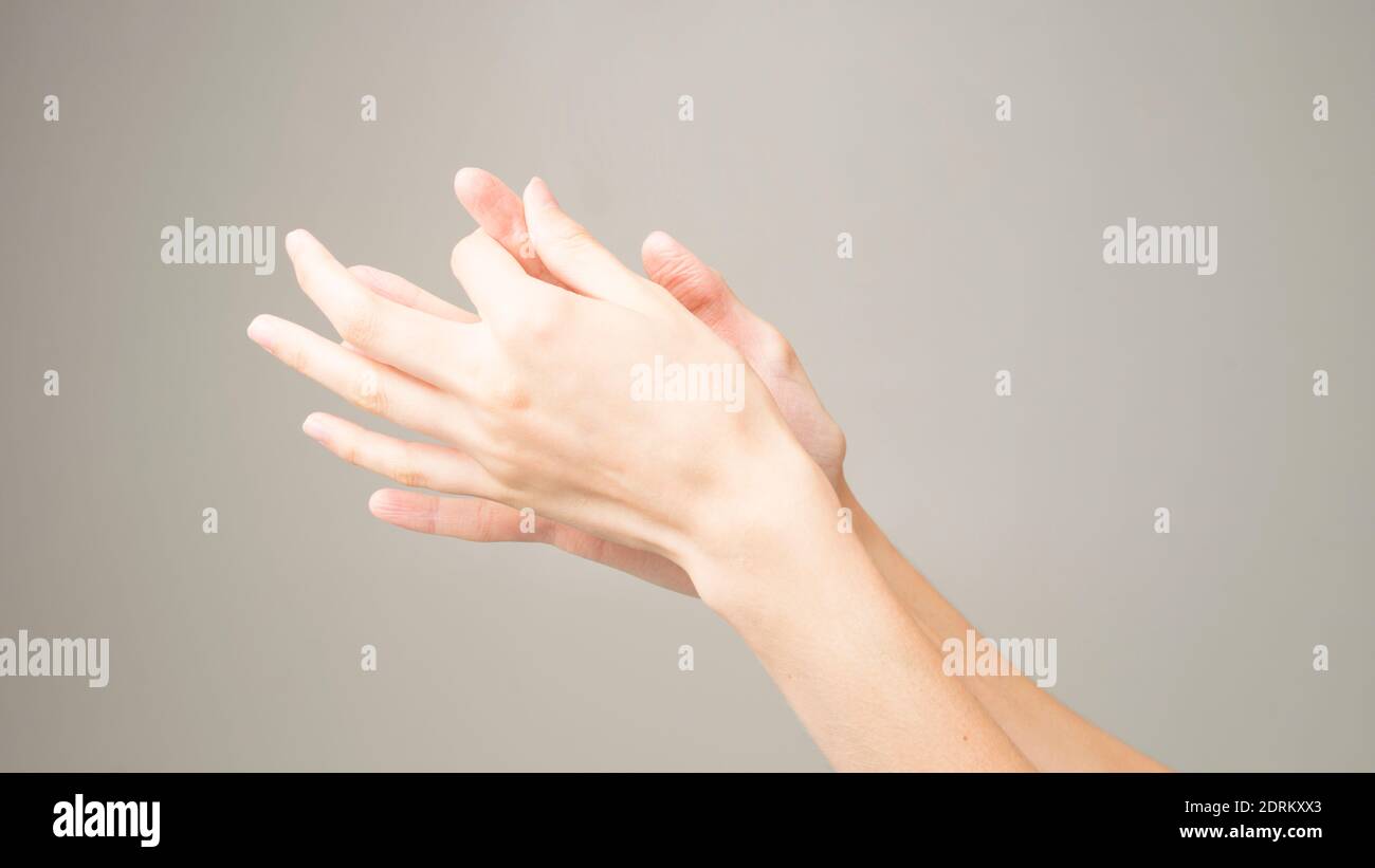 Parkinson's disease symptoms. Close up of tremor (shaking) hands of