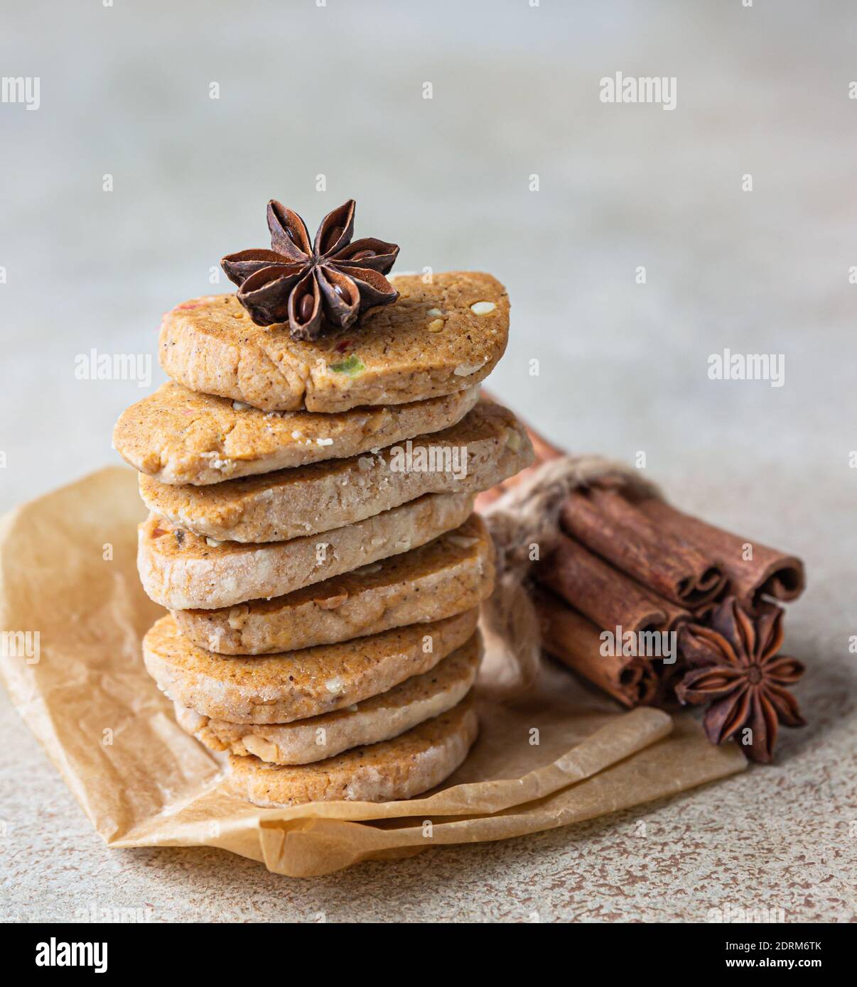 Shortbread cookies with candied fruits on light concrete background. Tutti Frutti cookies. Selective focus. Stock Photo
