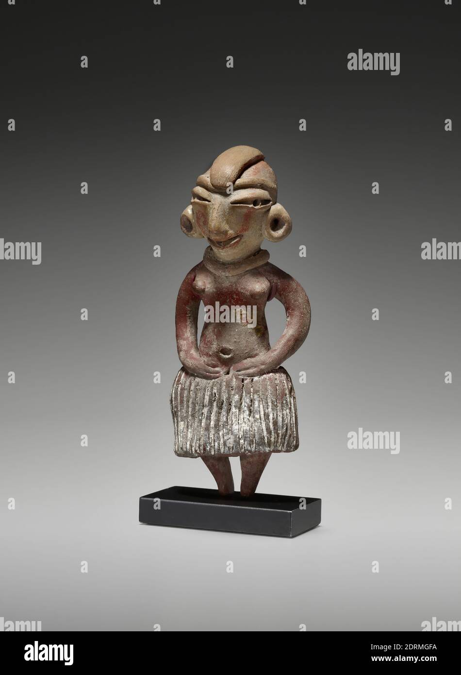 Maker: Unknown, Female Figure with Skirt, Ceramic with pigment, 8.89 × 3.175 × 1.905 cm (3 1/2 × 1 1/4 × 3/4 in.), Made in Tlatilco, Mexico, Mexico, Tlatilco, Early Formative Period, Sculpture Stock Photo