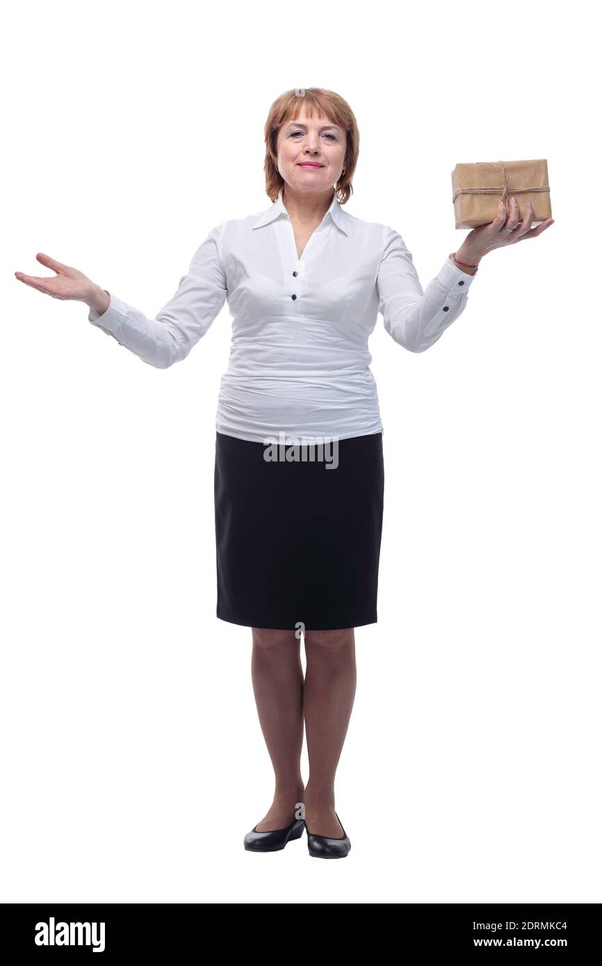 Full body senior woman happy and smiling, holding a gift Stock Photo
