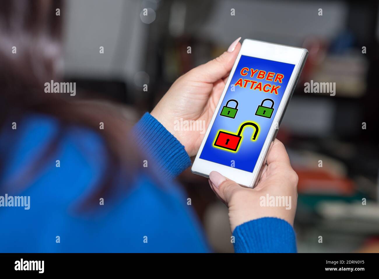 Phone Attacking Hand Smartphone screen displaying a cyber attack concept Stock Photo - Alamy