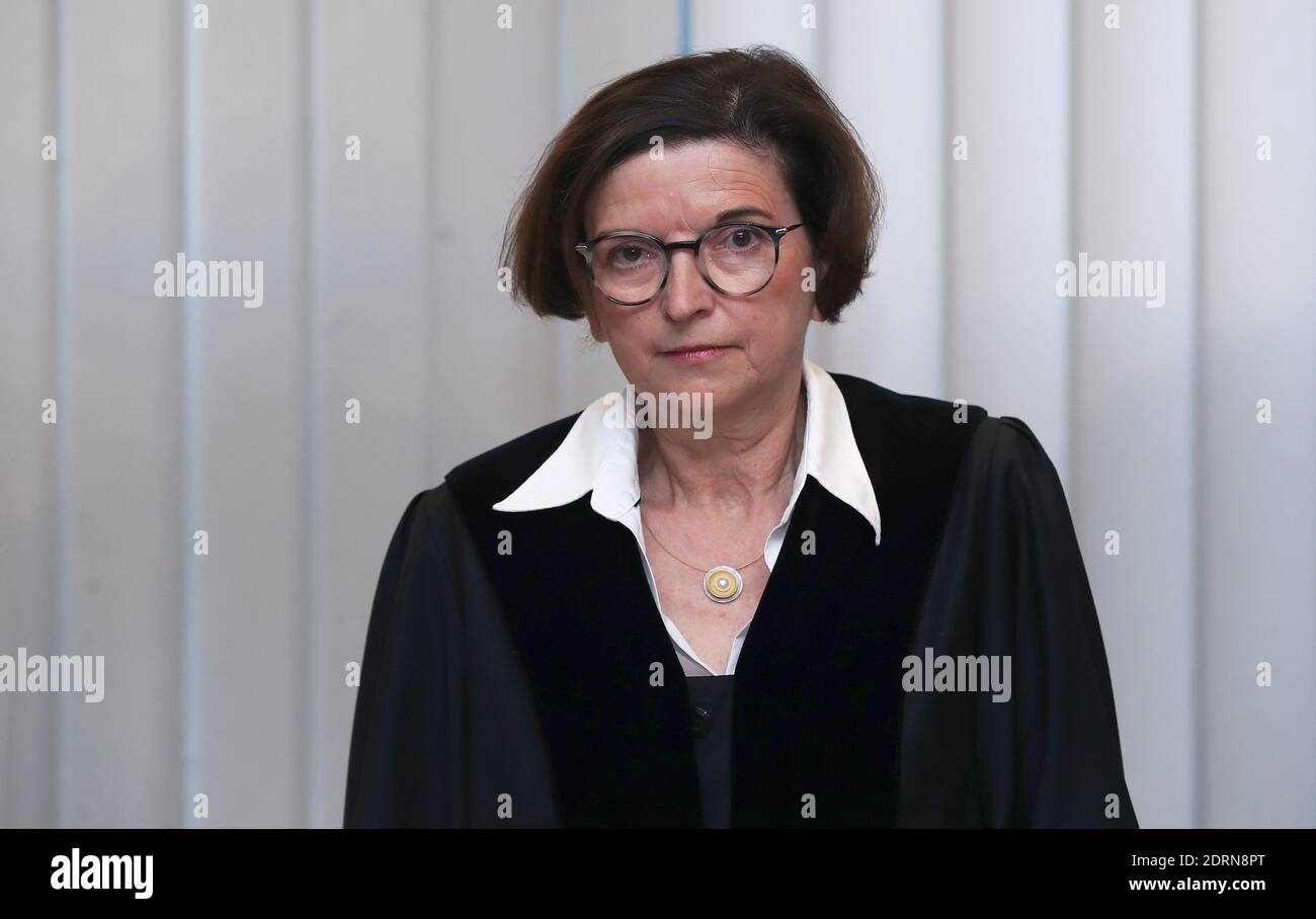 Magdeburg, Germany. 21st Dec, 2020. Ursula Mertens, presiding judge, stands at her seat at the beginning of the 26th day of the trial. Afterwards, the court's verdict on the terrorist attack in Halle is expected. The federal prosecution accuses the assassin of Halle 13 crimes, including murder and attempted murder. The assassin had tried to cause carnage in the synagogue in Halle on 09 October 2019 on the highest Jewish holiday Yom Kippur. Credit: Ronny Hartmann/AFP/POOL/dpa/Alamy Live News Stock Photo