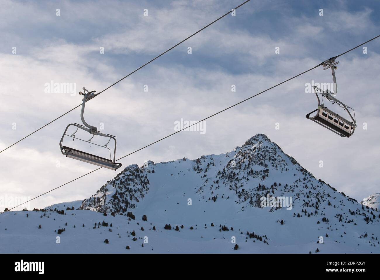 An empty skilift in a ski resort of the Aragonese Pyrenees, in Spain. Stock Photo