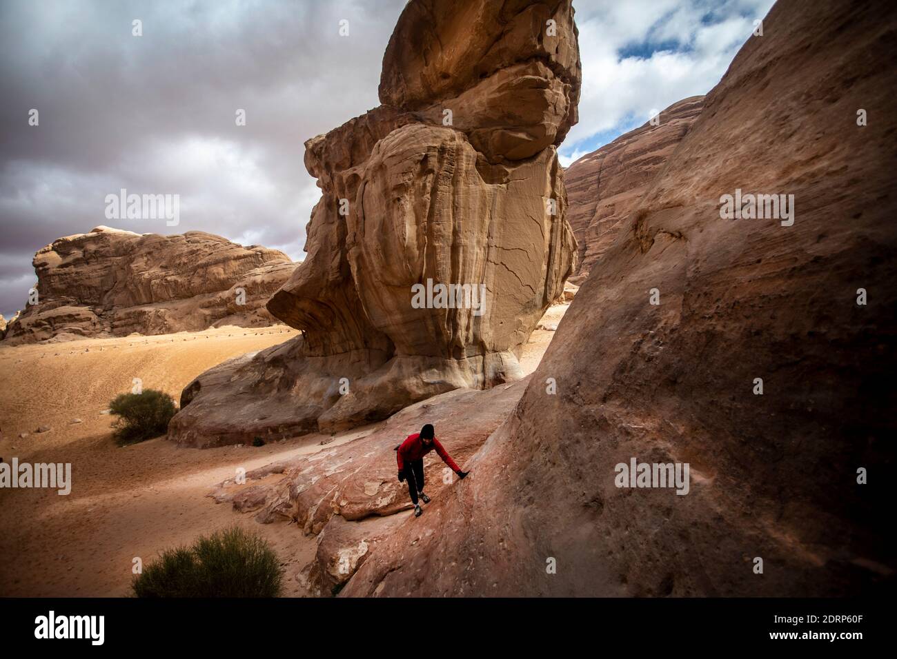Turist doing trekking in Wadi Rum Desert, Jordan, feb 2020, few weeks before the global lockdown. Stock Photo