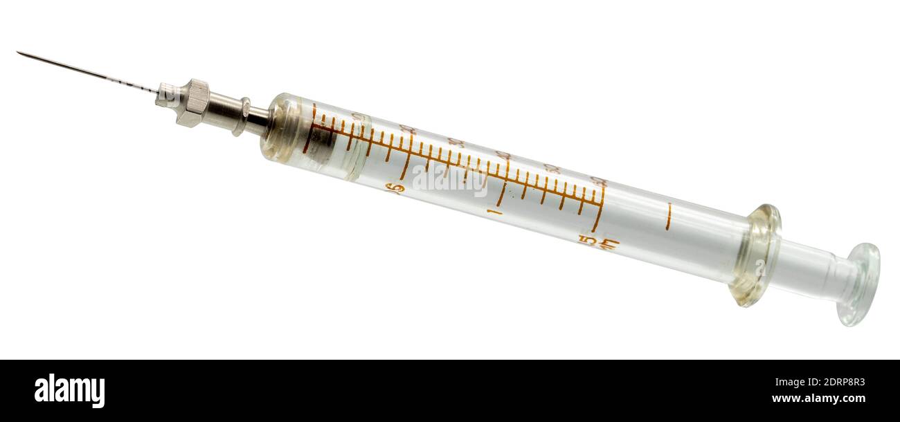 Old glass medical syringe isolated on a white background Stock Photo