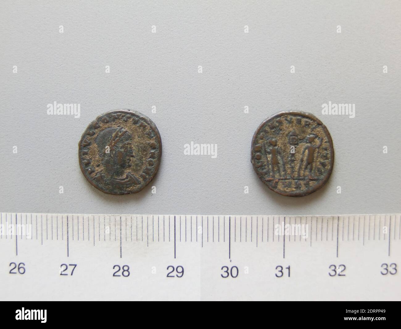 Ruler: Constantine I, Emperor of Rome, A.D. 285–337, ruled A.D. 306–337, Mint: Cyzicus, Honorand: Constans I, Emperor of Rome, ca. A.D. 323–350, ruled 337–50, 1 Nummus of Constantine I, Emperor of Rome from Cyzicus, 335–37, Argentiferous bronze, 2.11 g, 6:00, 16.1 mm, Made in Cyzicus, Mysia, Roman, 4th century, Numismatics Stock Photo
