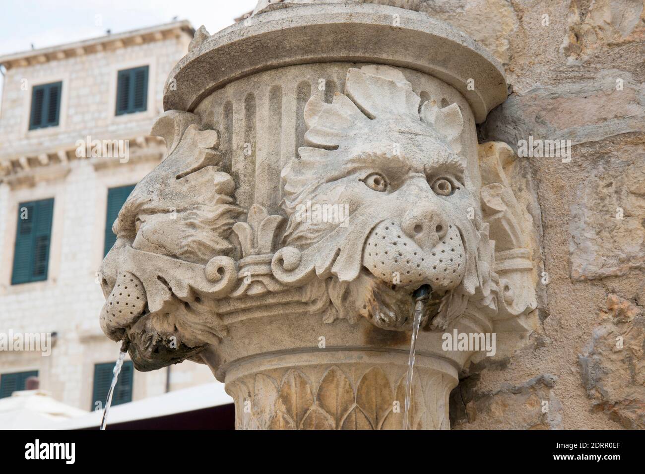 Dubrovnik, Dubrovnik-Neretva, Croatia. Stone fountain carved with lions' heads in Gundulić Square. Stock Photo
