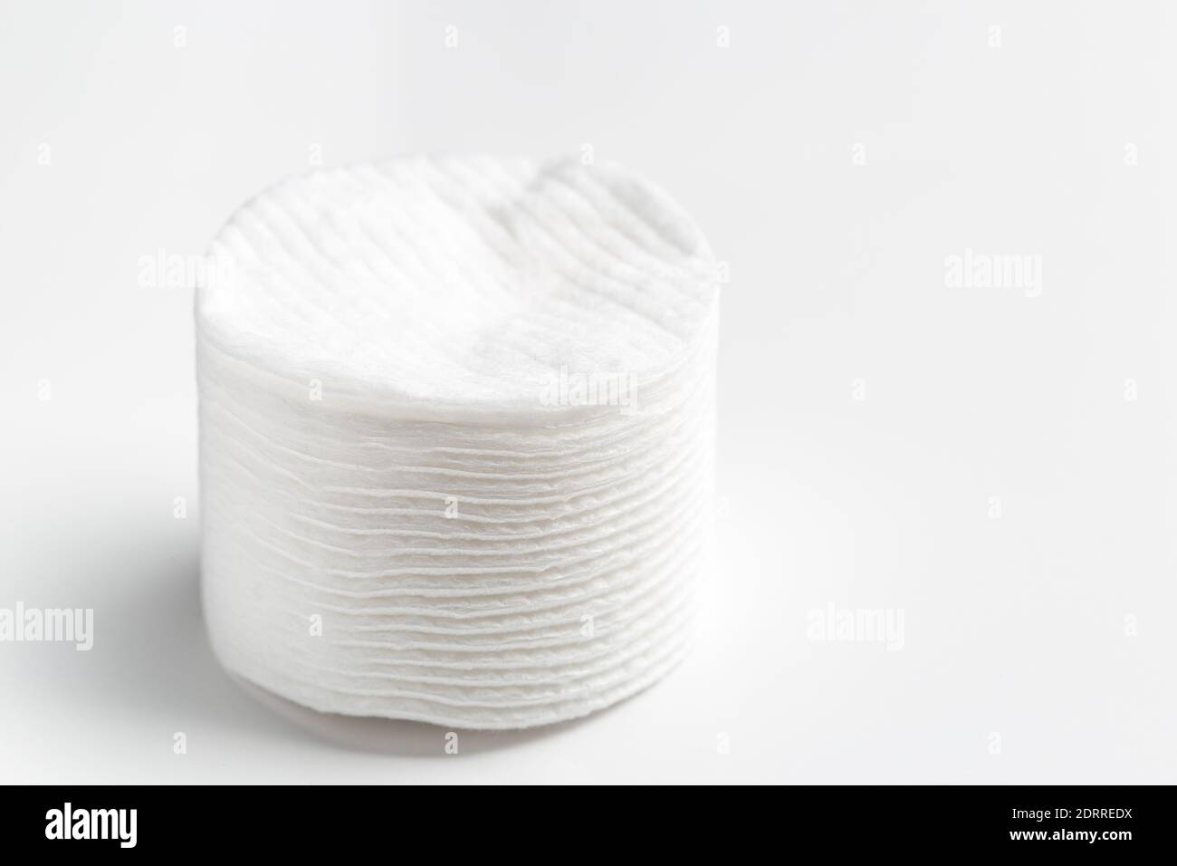 Cotton pads stack on gray background Stock Photo
