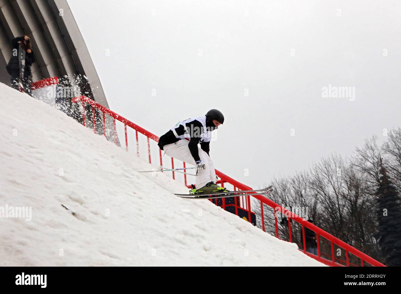Non Exclusive: KYIV, UKRAINE - DECEMBER 20, 2020 - A freeskier goes down a slope during the Double Triple Snow Fest 2020 at the Friendship of the Nati Stock Photo