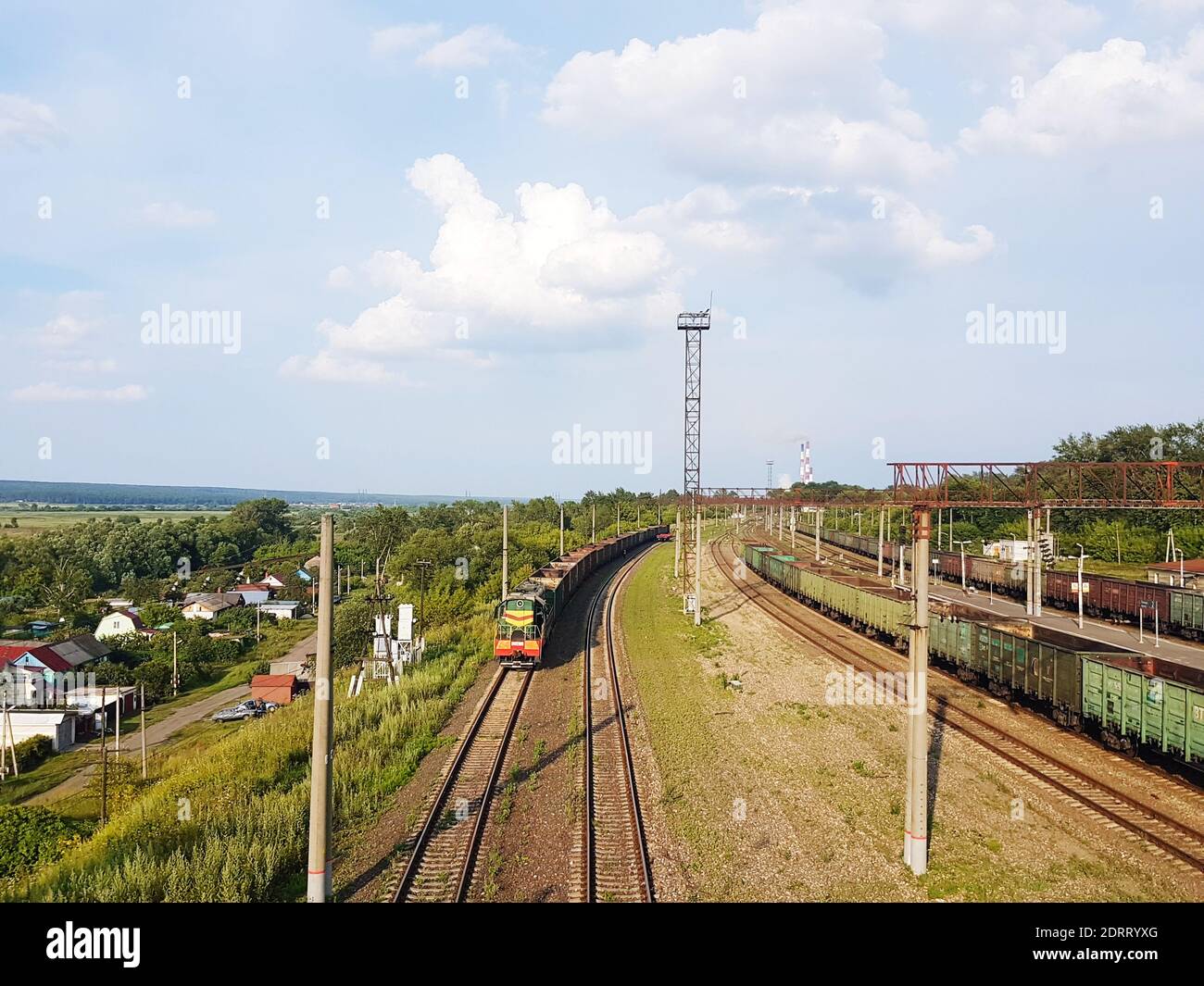 Train On Railroad Track Against Sky Stock Photo