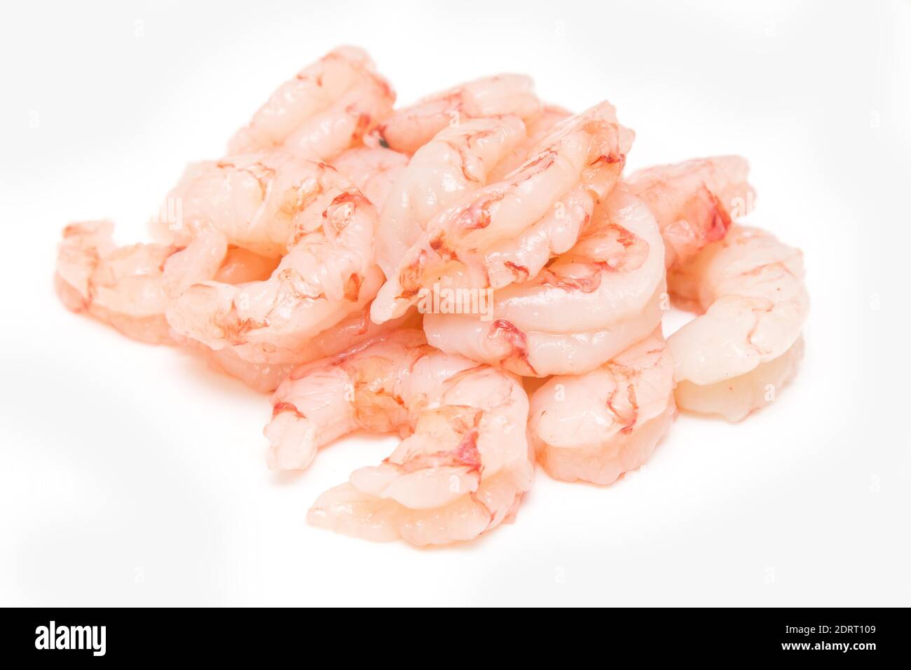 Argentinian raw peeled red shrimp isolated on a white studio background. Stock Photo