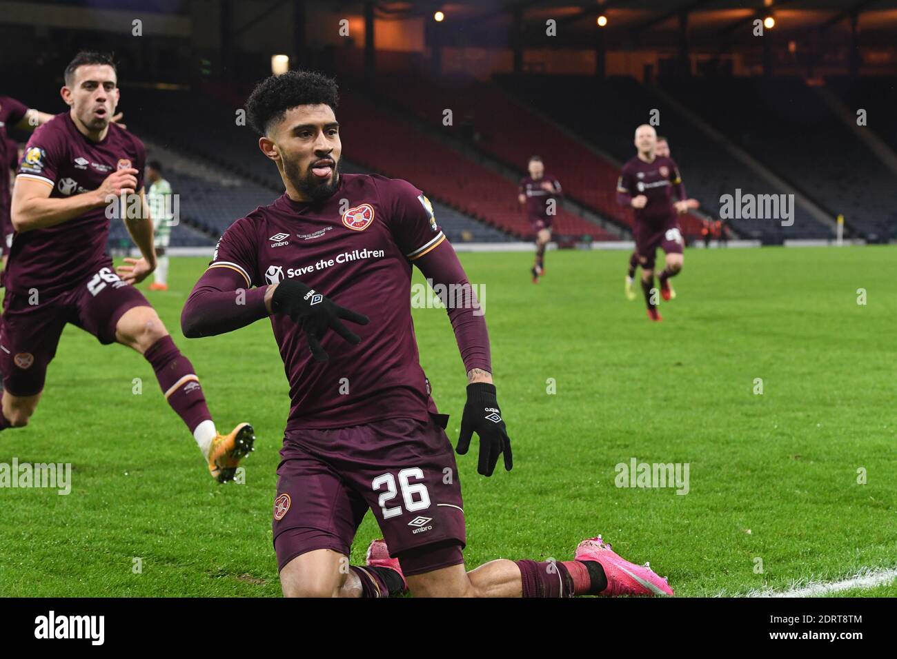 Hampden Park, Glasgow, Scotland, UK.  20th December, 2020. William Hill Scottish Cup Final 2019-20.  Pic shows Hearts Josh Ginnelly (L) celebrating his equalising goal in the 3-3 draw AET 4-3 with Olly Lee Credit: eric mccowat/Alamy Live News Stock Photo