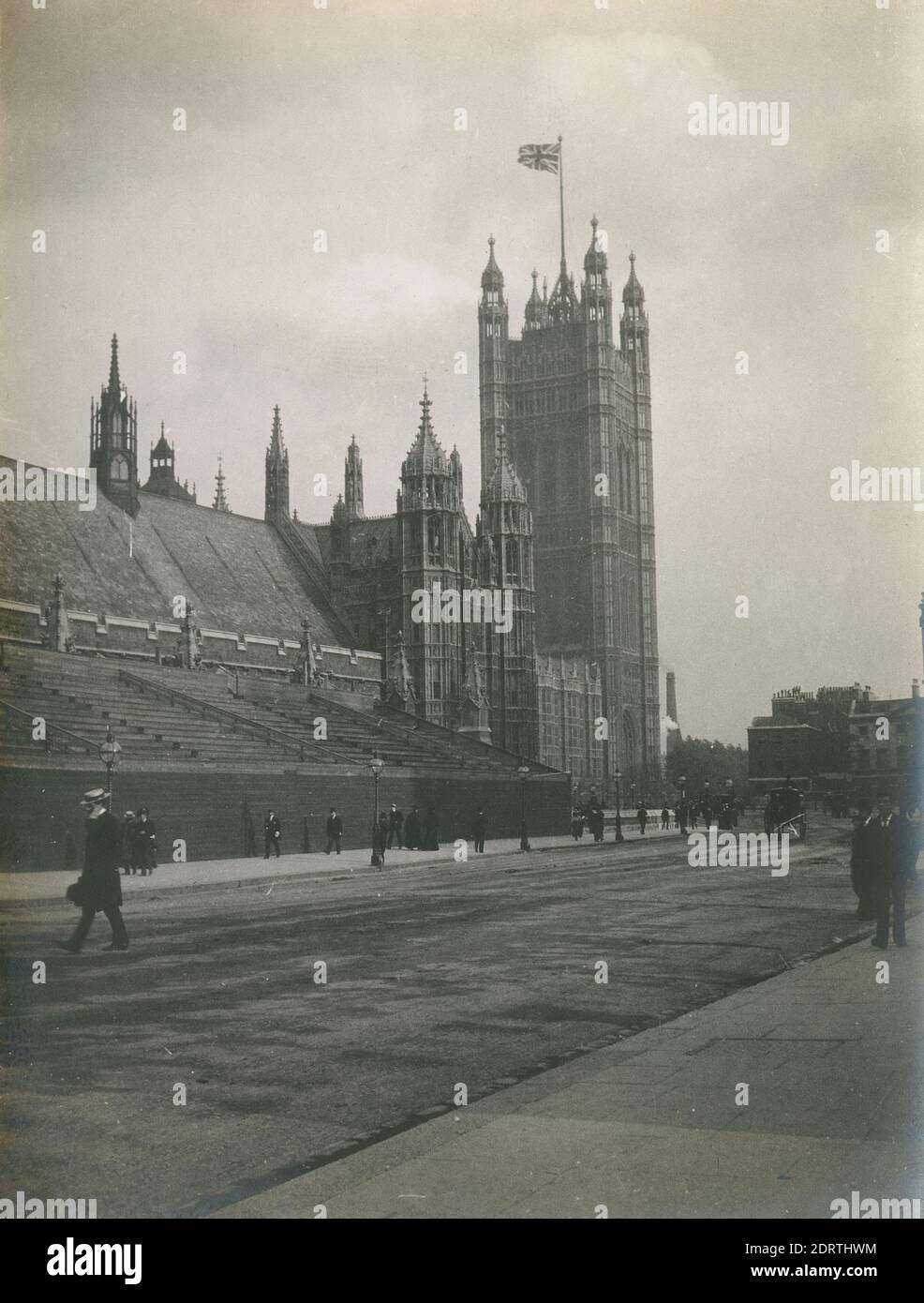 Antique c1900 photograph, Palace of Westminster from Abingdon Street in London, England. There are bleachers set up in front of Westminster Hall, perhaps for the Coronation procession of King Edward VII in 1902. SOURCE: ORIGINAL PHOTOGRAPH Stock Photo
