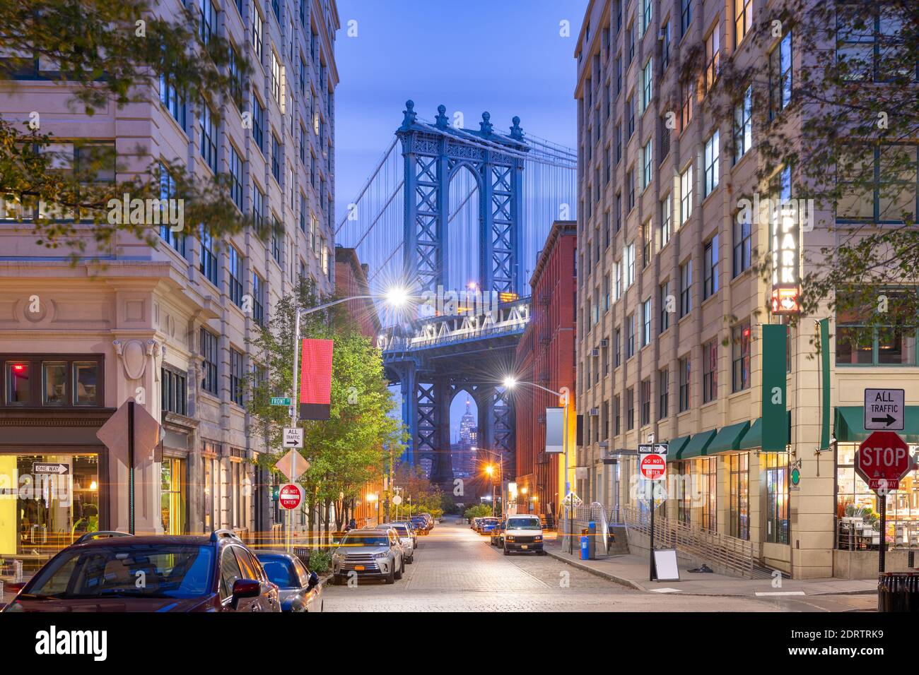 Brooklyn, New York, USA street scene at the Brooklyn Bridge during twilight. Stock Photo