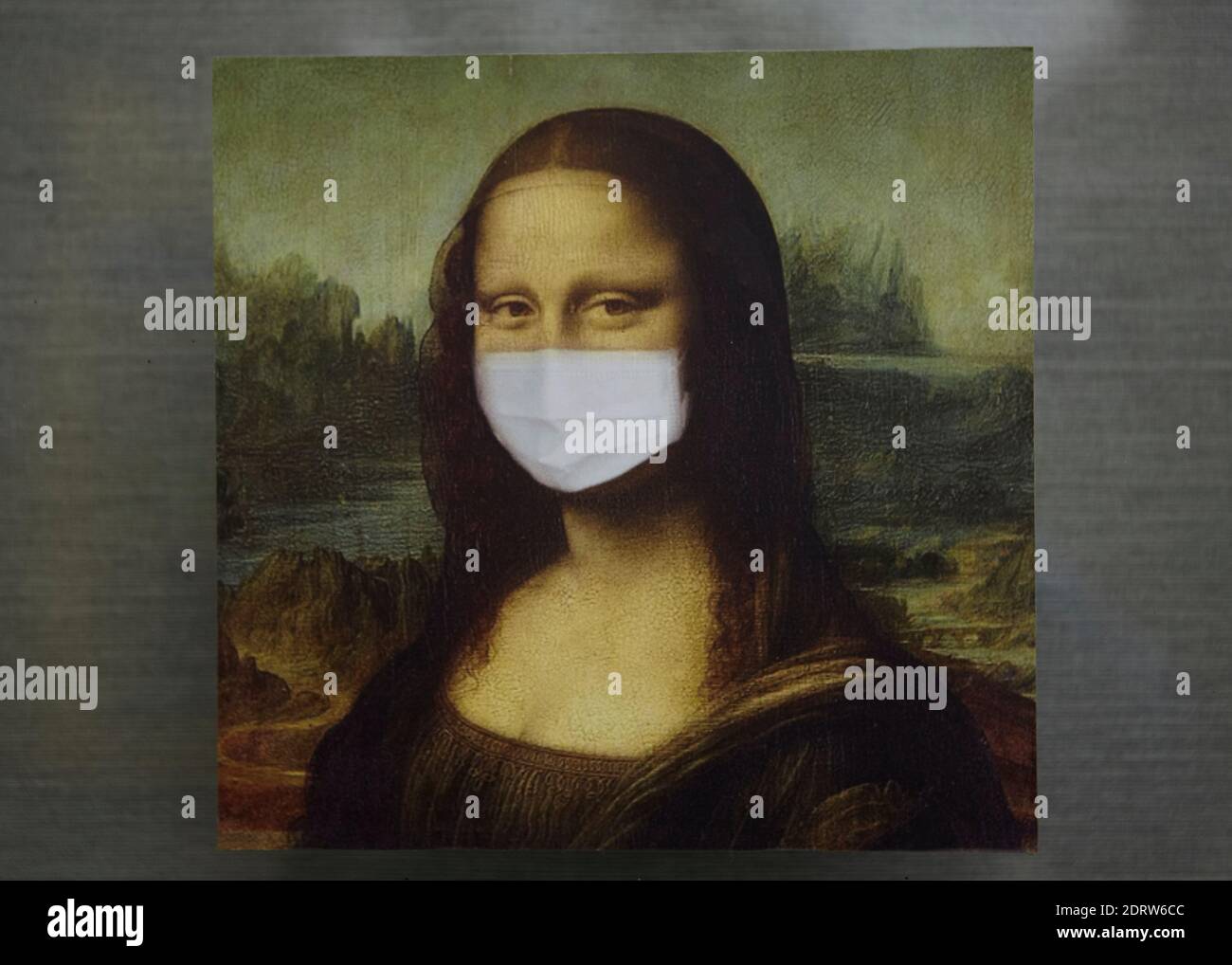 Mona Lisa , wearing a protective mask , coronavirus Stock Photo