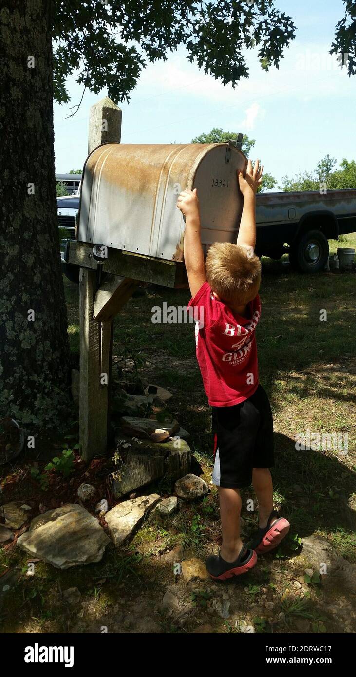 Mailbox And Boy High Resolution Stock Photography and Images - Alamy