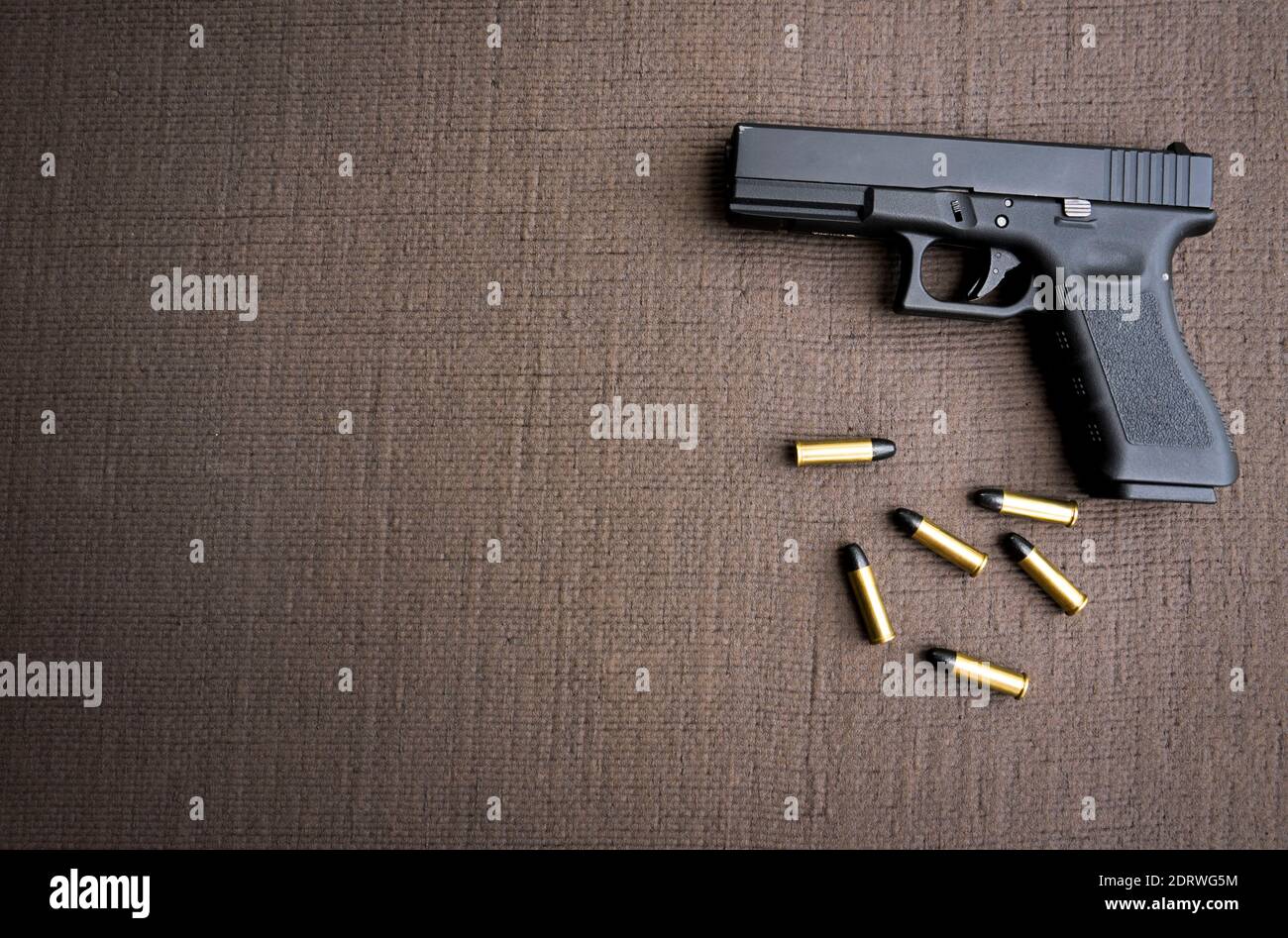 Directly Above Shot Of Handgun And Bullets On Table Stock Photo - Alamy