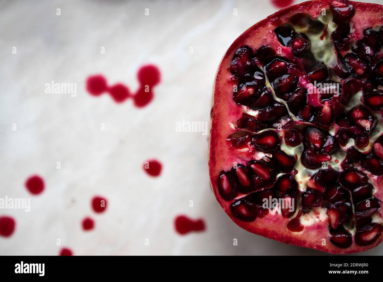 Sliced fresh pomegranate Stock Photo