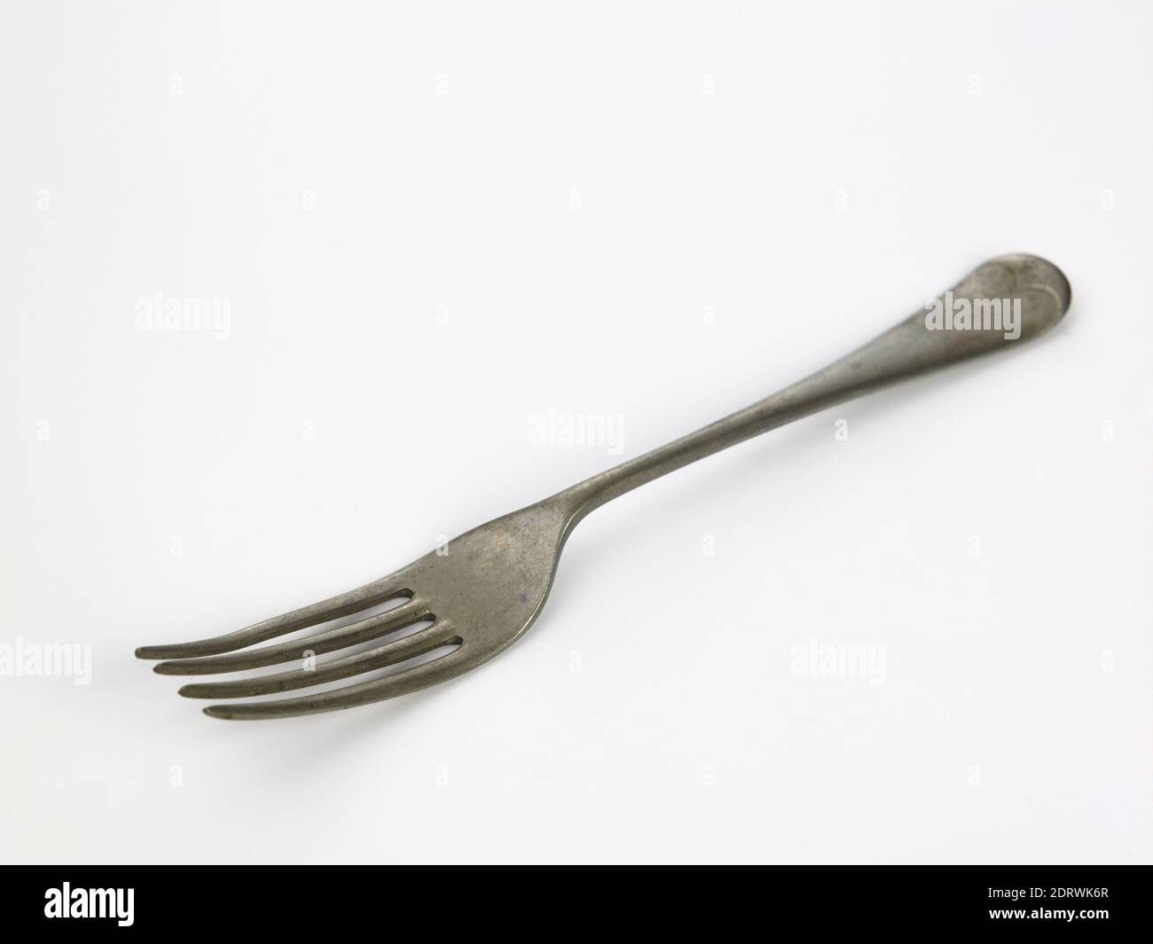 Closeup Of Dirty Fork Over White Background Stock Photo Alamy