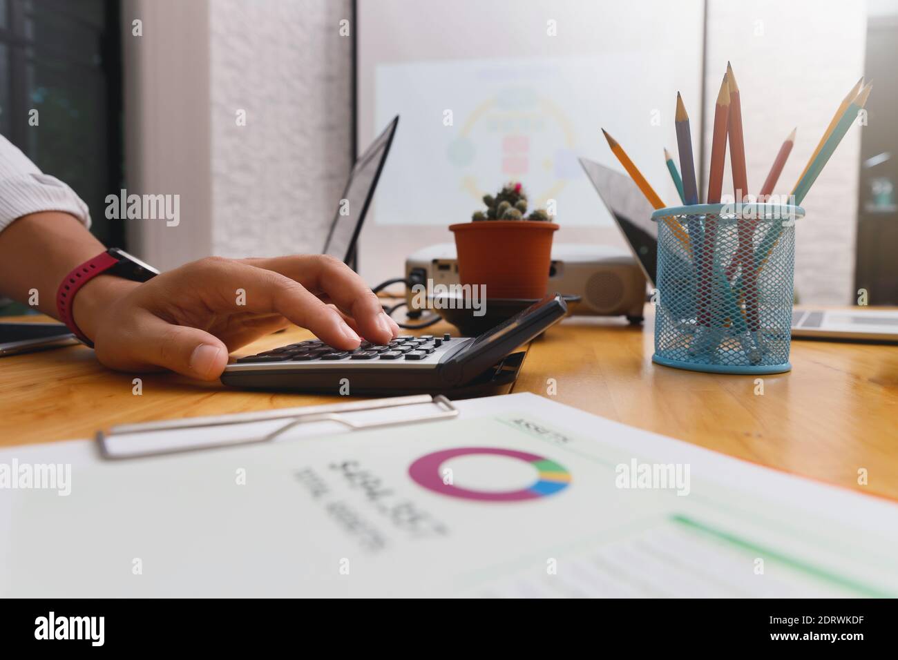 Financial businessman accounting calculating cost economic budget in home office. Investment and