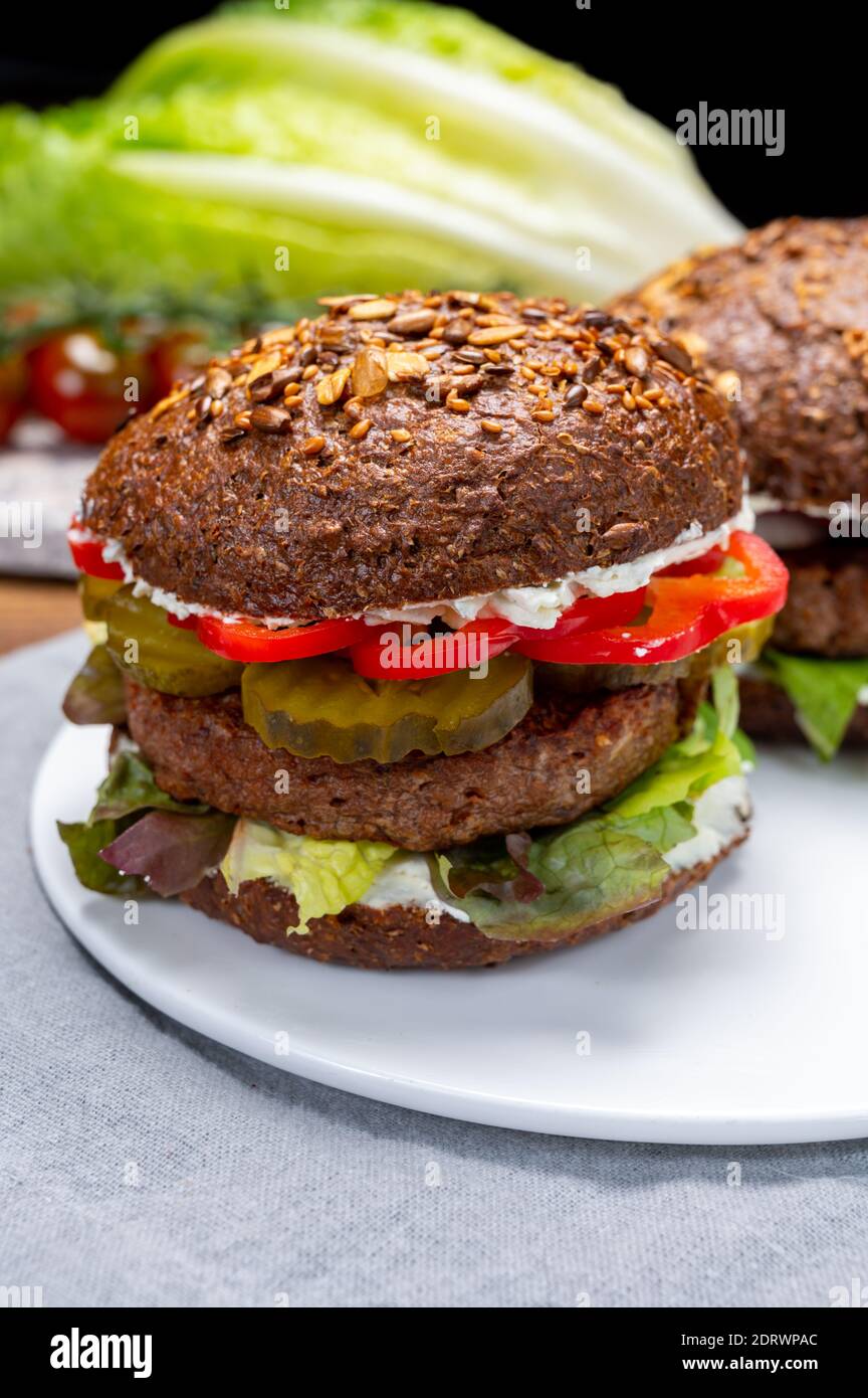Vegan hamburgers with grilled healthy plant based, meat free burgers
