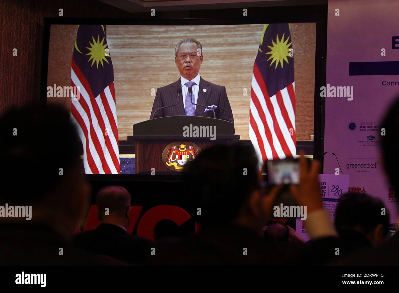 Kuala Lumpur. 21st Dec, 2020. Malaysian Prime Minister Muhyiddin Yassin delivers a speech via video during the World Chinese Economic Summit 2020 in Kuala Lumpur, Malaysia, Dec. 21, 2020. China has played a significant role in upholding the international trading system and opposing protectionism and unilateralism since the outbreak of COVID-19, Malaysian Prime Minister Muhyiddin Yassin said on Monday.TO GO WITH 'China has played significant role in upholding int'l trading system: Malaysian PM' Credit: Xinhua/Alamy Live News Stock Photo