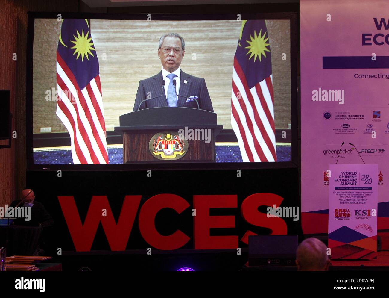 Kuala Lumpur. 21st Dec, 2020. Malaysian Prime Minister Muhyiddin Yassin delivers a speech via video during the World Chinese Economic Summit 2020 in Kuala Lumpur, Malaysia, Dec. 21, 2020. China has played a significant role in upholding the international trading system and opposing protectionism and unilateralism since the outbreak of COVID-19, Malaysian Prime Minister Muhyiddin Yassin said on Monday.TO GO WITH 'China has played significant role in upholding int'l trading system: Malaysian PM' Credit: Xinhua/Alamy Live News Stock Photo