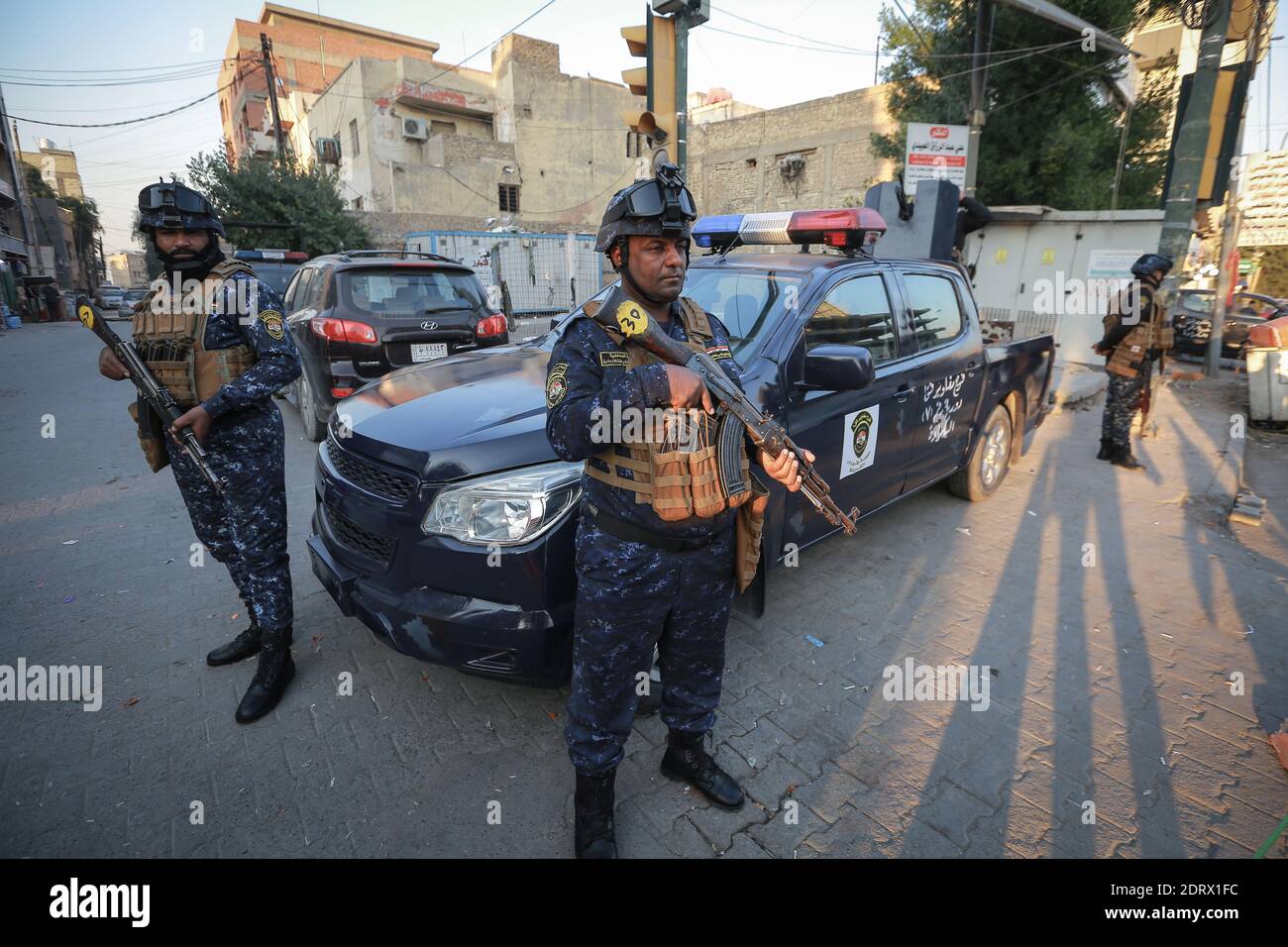 Baghdad, Iraq. 21st Dec, 2020. Iraqi police forces are deployed near the US Embassy in Baghdad, a day after several rockets were fired into Baghdad's Green Zone. Credit: Ameer Al Mohammedaw/dpa/Alamy Live News Stock Photo