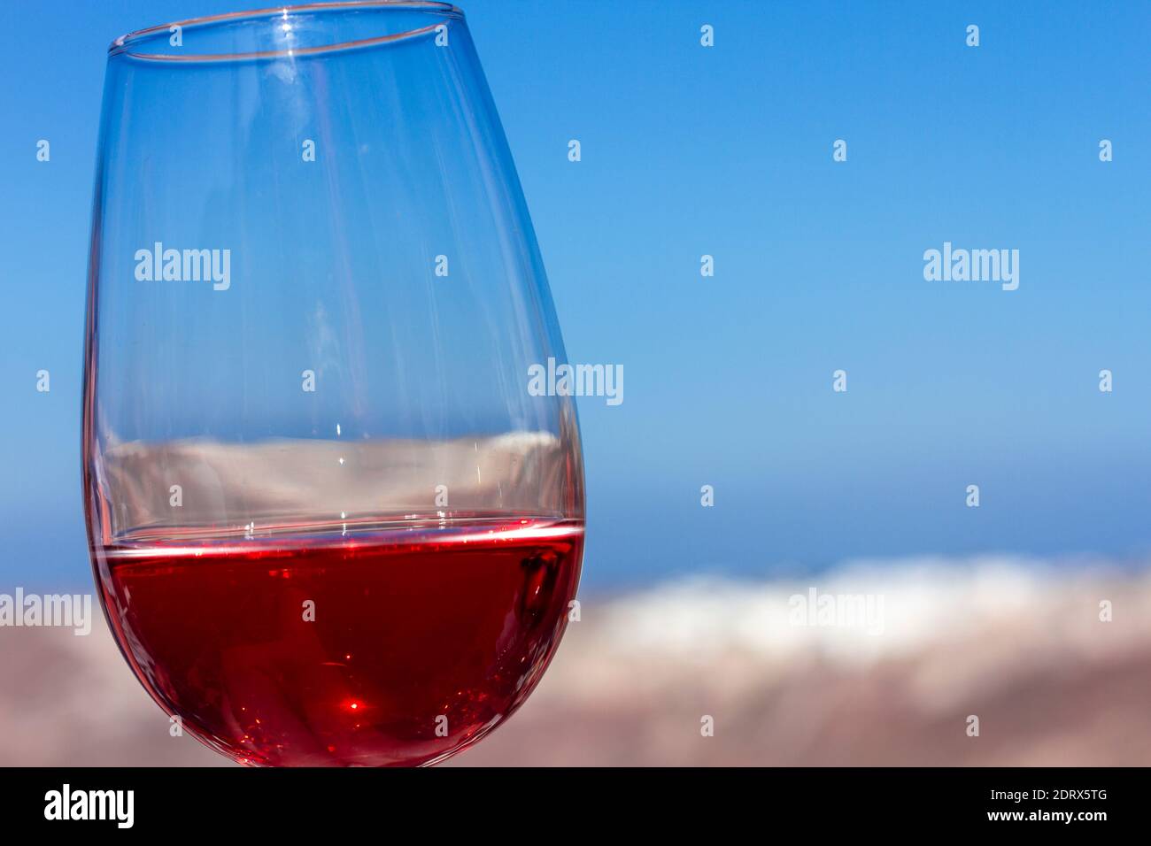 Glass of red wine, a local product of Santorini island, Cyclades, Aegean Sea, Greece, Europe Stock Photo