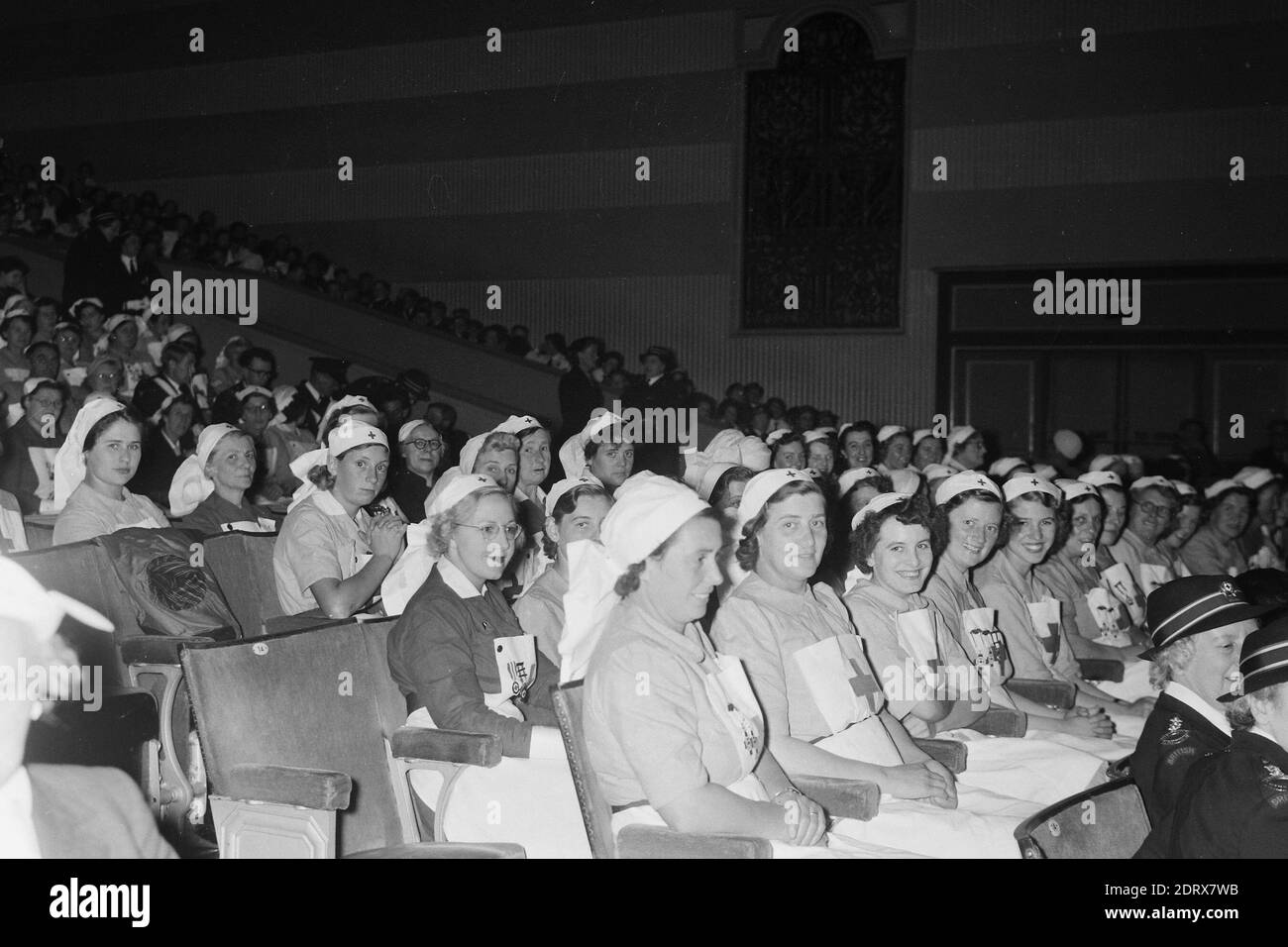 Butlins Holiday Camp. Skegness, Lincolnshire, England, UK. Scanned negatives fro the 1950s Women from the Red Cross in theatre seated area Stock Photo