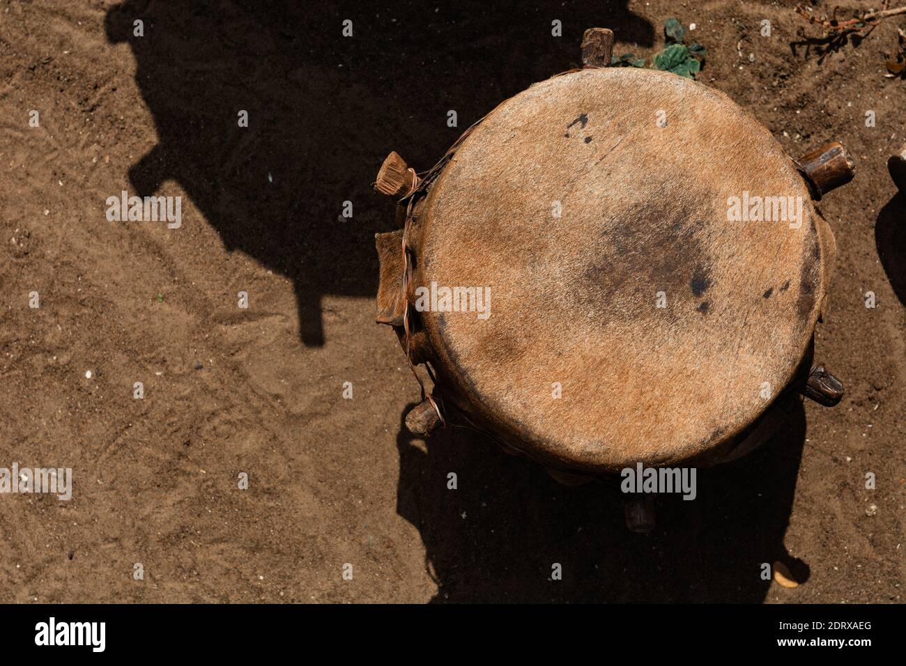 African Handmade Animal Skin Drum Put On The Sunlight To Dry Stock
