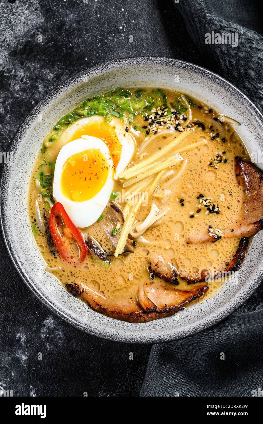 Ramen asian noodle soup with Beef tongue meat, mushroom and Ajitama