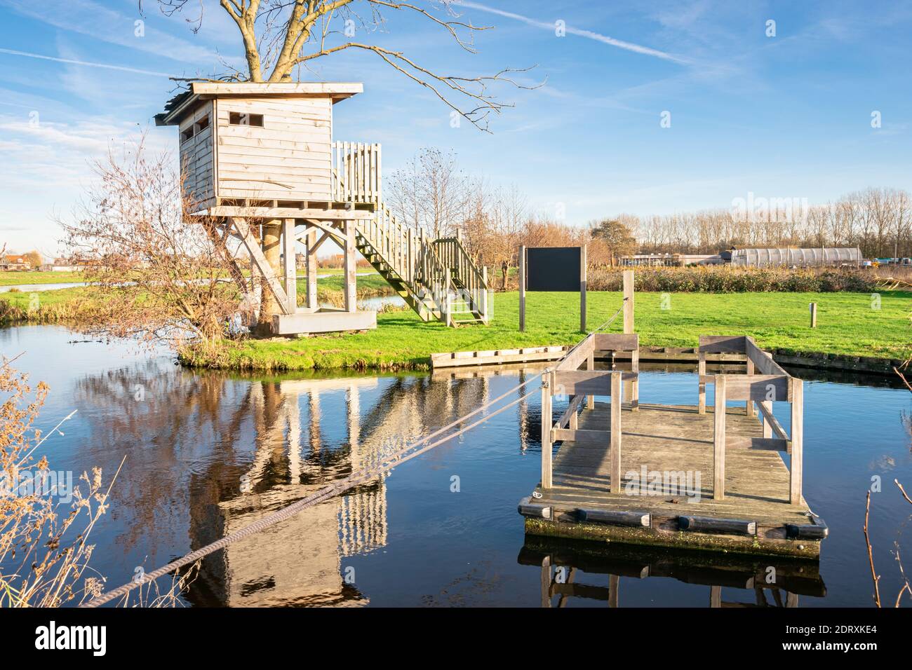 Wooden bird hide in Dutch polder 'Bloemendaal', near the city of Gouda, Holland Stock Photo
