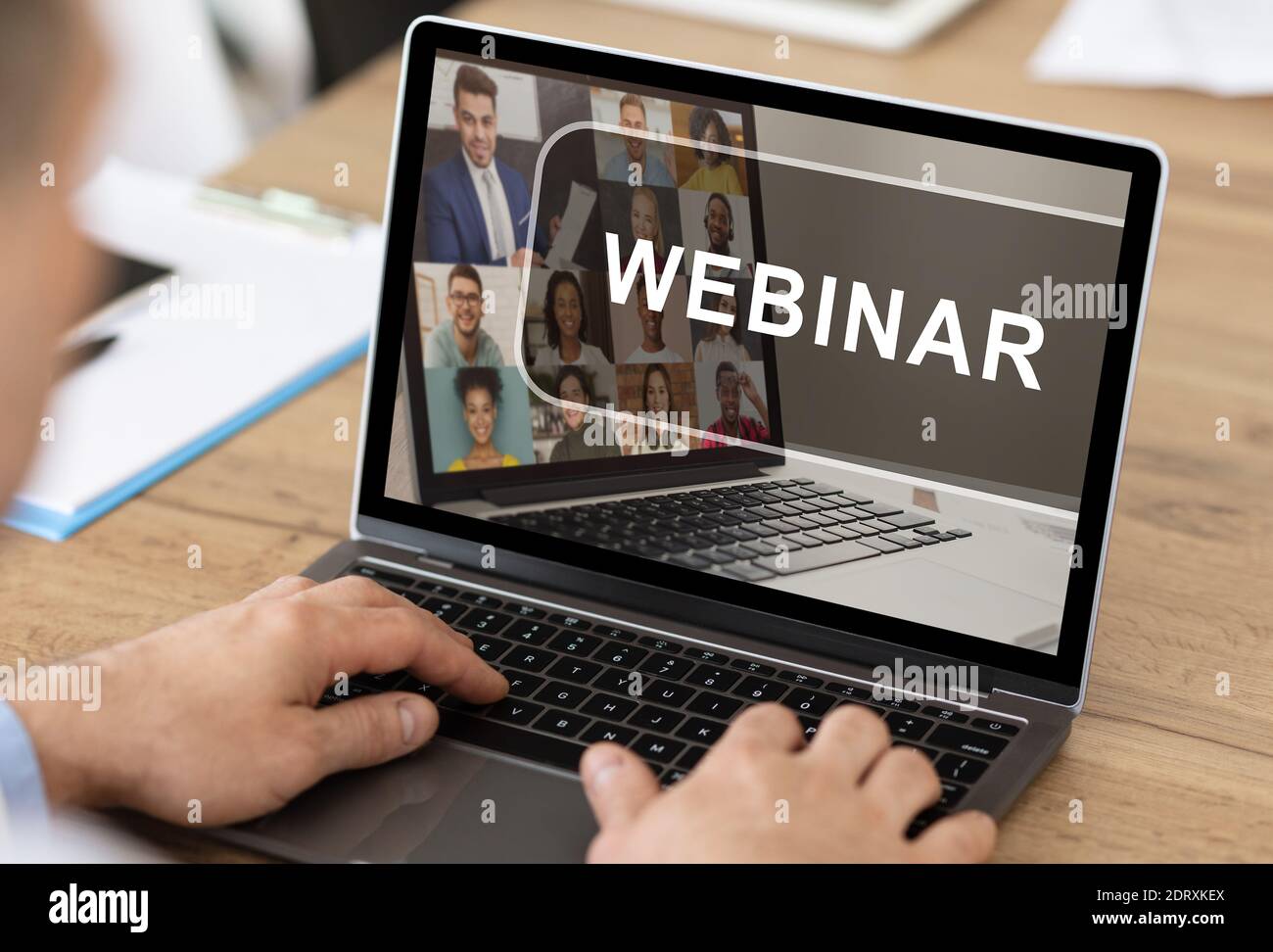 Unrecognizable man having webinar on laptop while working in office Stock Photo