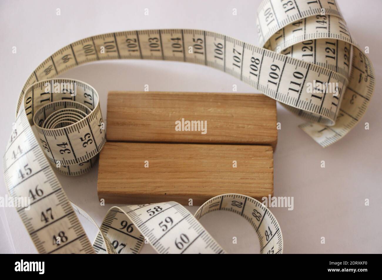 measuring tape and wooden blocks. Healthcare concept Stock Photo Alamy