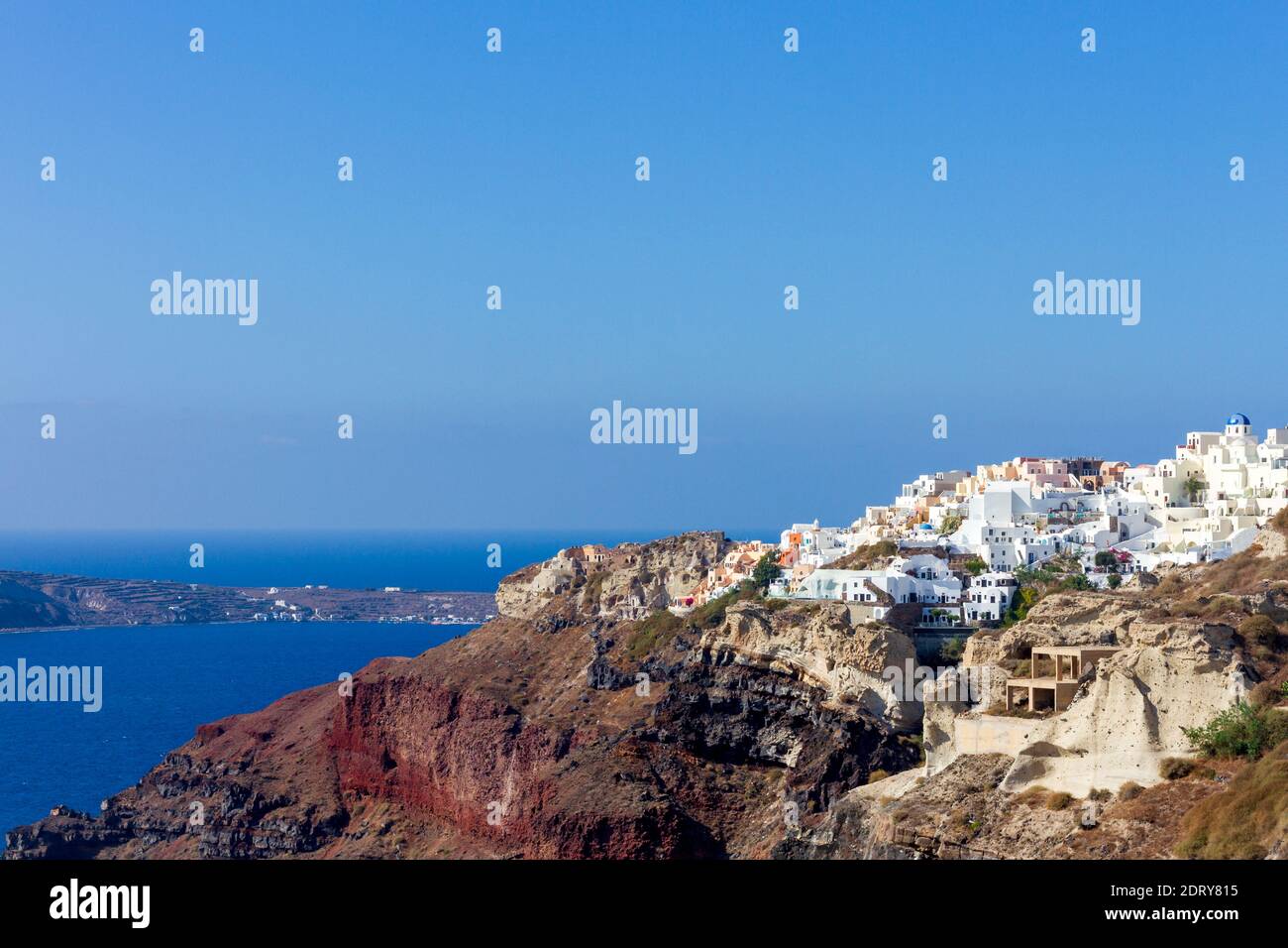 Oia village, the most picturesque village on Santorini island, as it spreads over the caldera, in Aegean sea, Greece, Europe Stock Photo