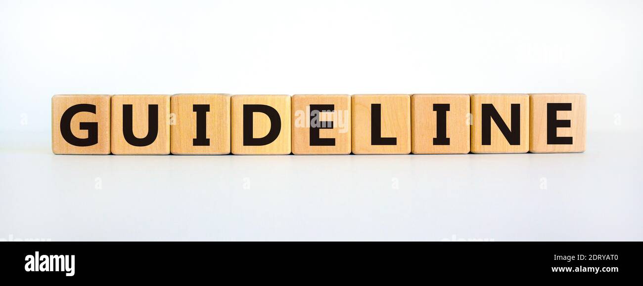 Guideline symbol. The word 'Guideline' on wooden cubes on beautiful ...
