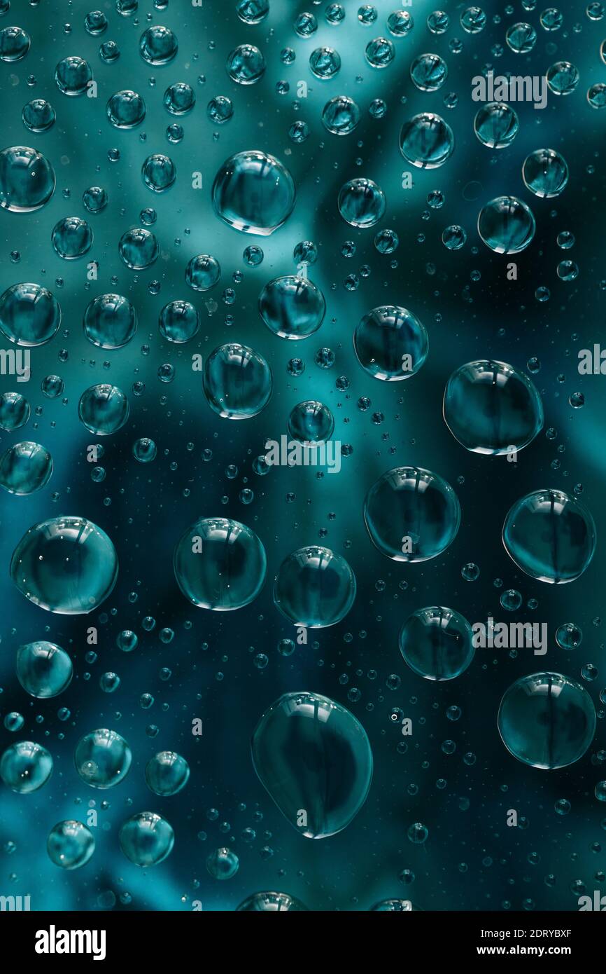 abstract selective focus colorful background with water drops. water bubbles multiple reflections. Stock Photo