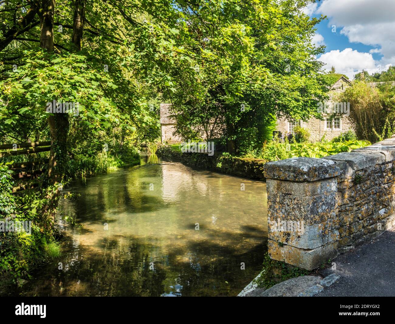 The pretty River Coln at Ablington in the Gloucestershire Cotswolds. Stock Photo